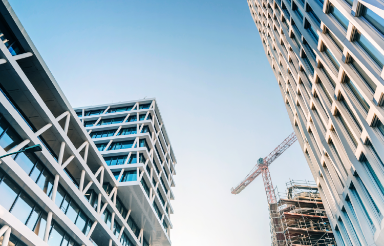 Apartment buildings being constructed, crane