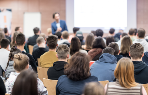 A group of people attending a lecture