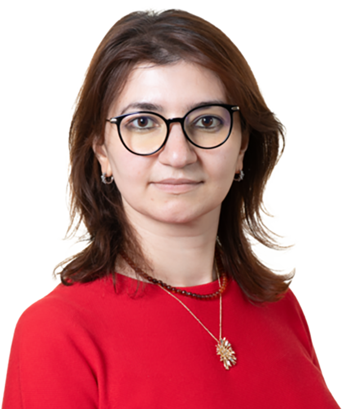 Woman wearing glasses and red top